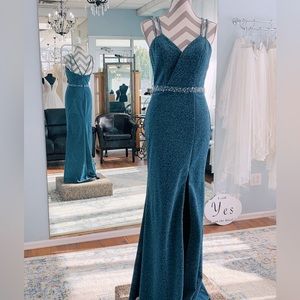 Madison James 3756RE Full Length gown with sequin waist detail and front slit
